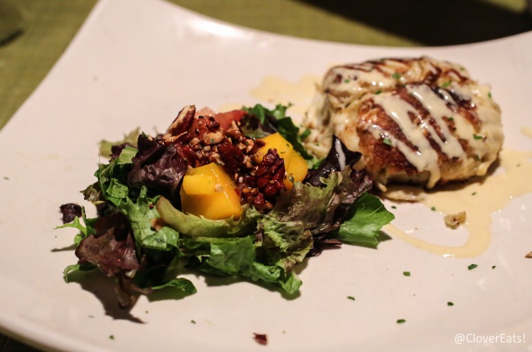 Crab Cake with mustard sauce and greens