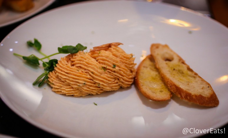 Salmon rilette with citrus, crostini, and pickled ramps