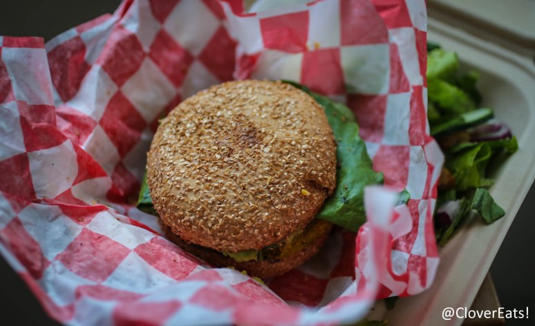 Chickpea-carrot patty, corn salsa, guacamole, lettuce, red pepper aioli