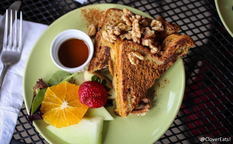 French toast - "Avalon organic soft whole wheat bread layered w/light cream cheese, maple syrup caramelized apples, cinnamon & raisins.  Topped w/toasted walnuts & served w/warm maple syrup."