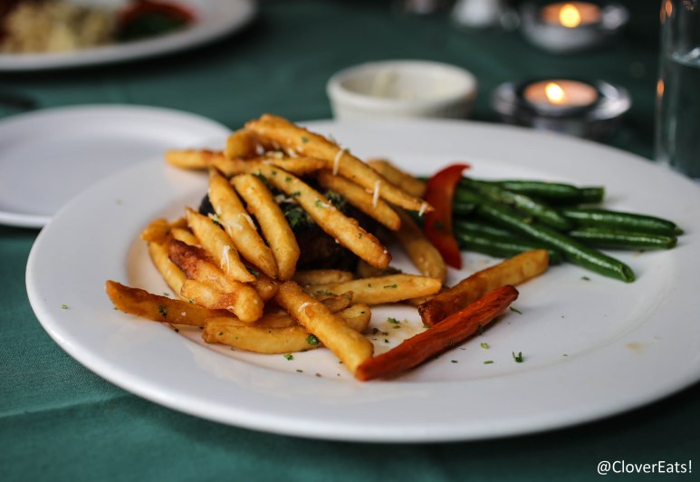 PETIT FILET  - A 6 OZ. BEEF TENDERLOIN SIMPLY GRILLED AND SERVED WITH A MAITRE’ D BUTTER; FINISHED WITH A HANDFUL OF PARMESAN-TRUFFLE FRENCH FRIES