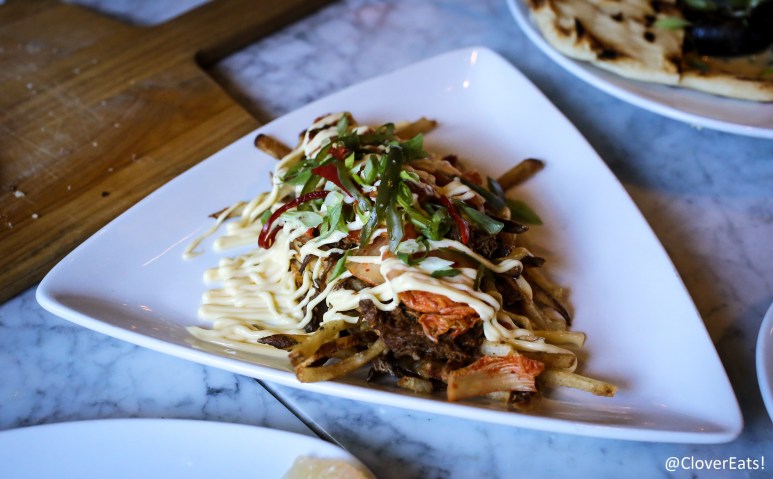 kimchi hand cut fries: pulled pork, kewpie mayonnaise, green onions, fresno chiles