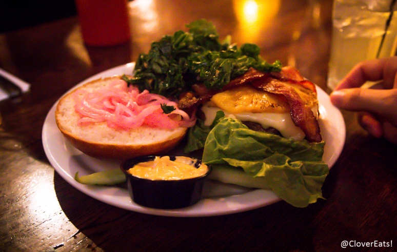 Maui Burger - ground beef patty topped with pepper jack cheese, smoked applewood bacon, pickled red onion, grilled pineapple, romaine lettuce with chipotle mayo