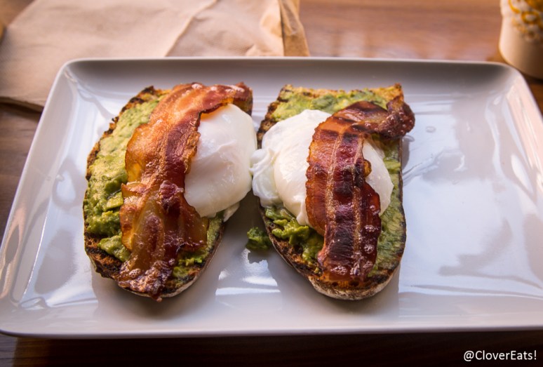 Avocado on toast, egg, bacon tartine