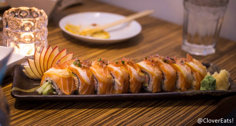 Salmon Sunshine - Snow crab, cucumber, avocado, spicy mayo, fresh salmon, lemon, pico de gallo, ponzu sauce