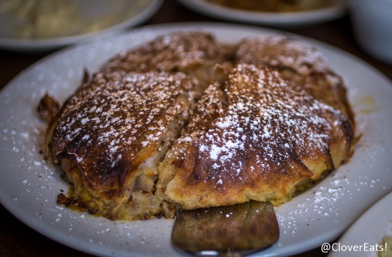 Bistilla Herb saffron chicken, orange blossom water, honey, almonds powdered sugar, and cinnamon.