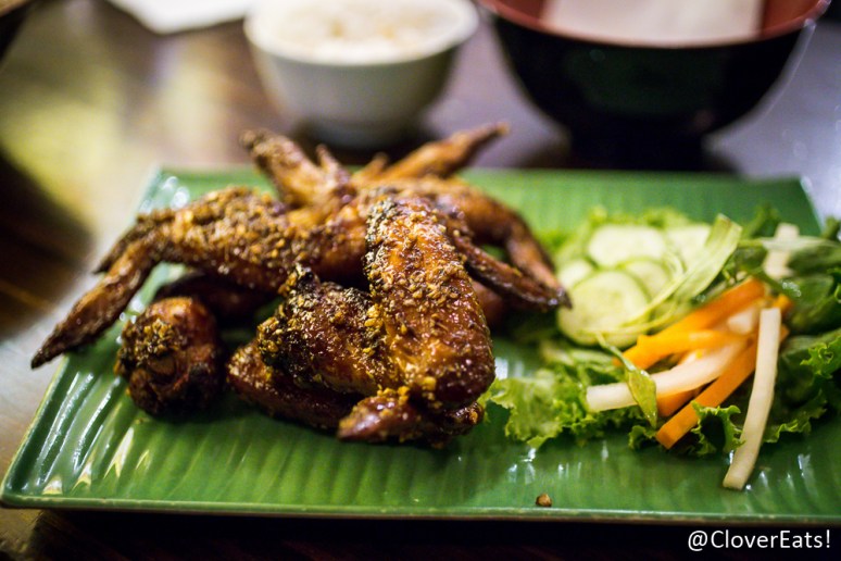 Ike’s Vietnamese Fish Sauce Wings - Half dozen fresh whole natural chicken wings marinated in fish sauce and sugar, deep fried, tossed in caramelized Phu Quoc fish sauce and garlic and served with Vietnamese table salad. The signature dish. Based on the daytime cook Ike’s recipe from his home in Vietnam. 