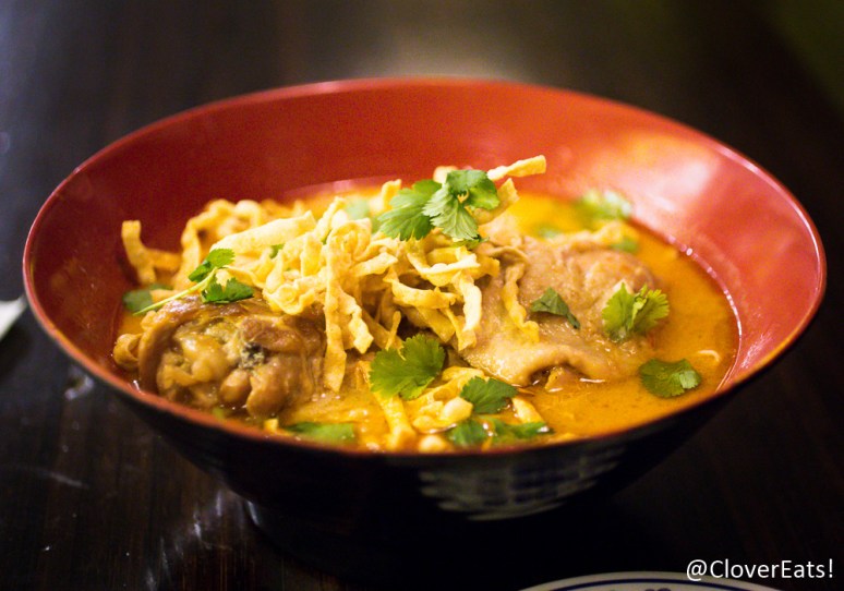 Khao Soi - Northern Thai mild curry noodle soup made with our secret curry paste recipe and house-pressed fresh coconut milk. Served with house pickled mustard greens, shallots, crispy yellow noodles and roasted chili paste. 